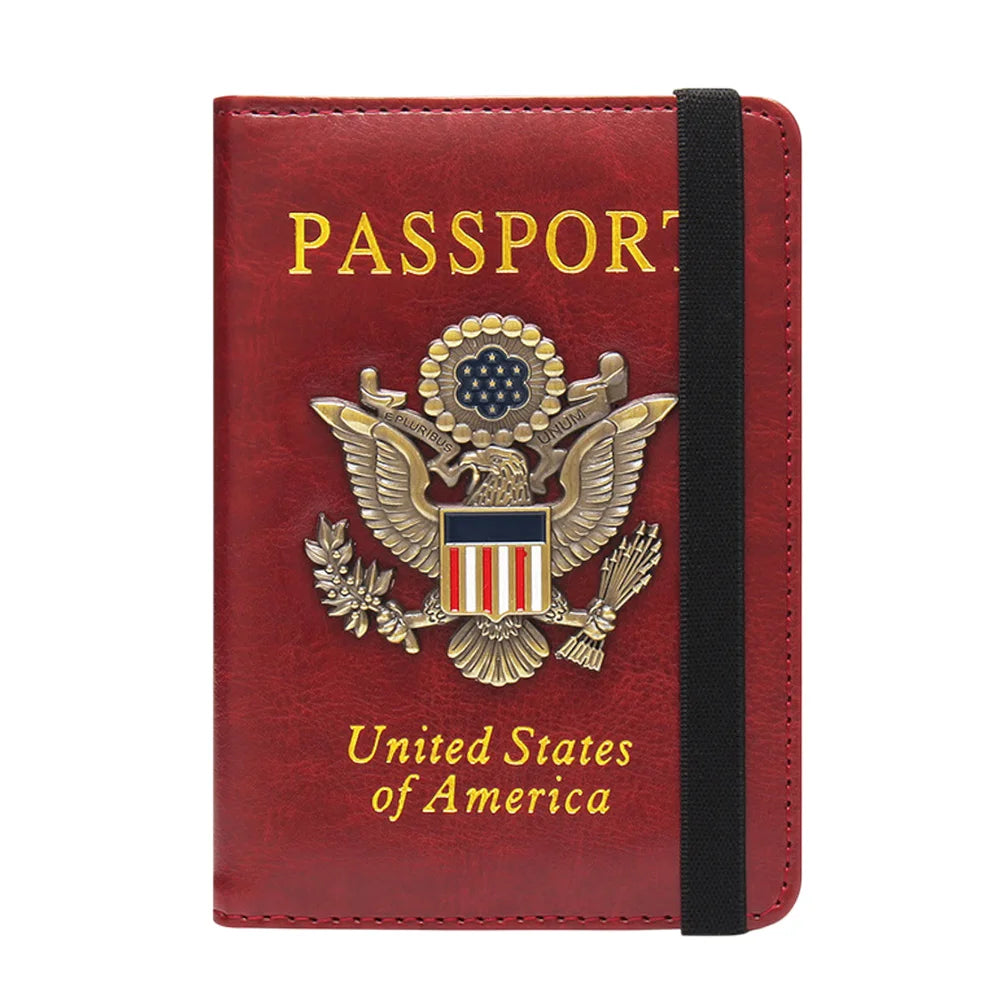 A red leather passport holder featuring a gold-colored United States eagle badge and text.