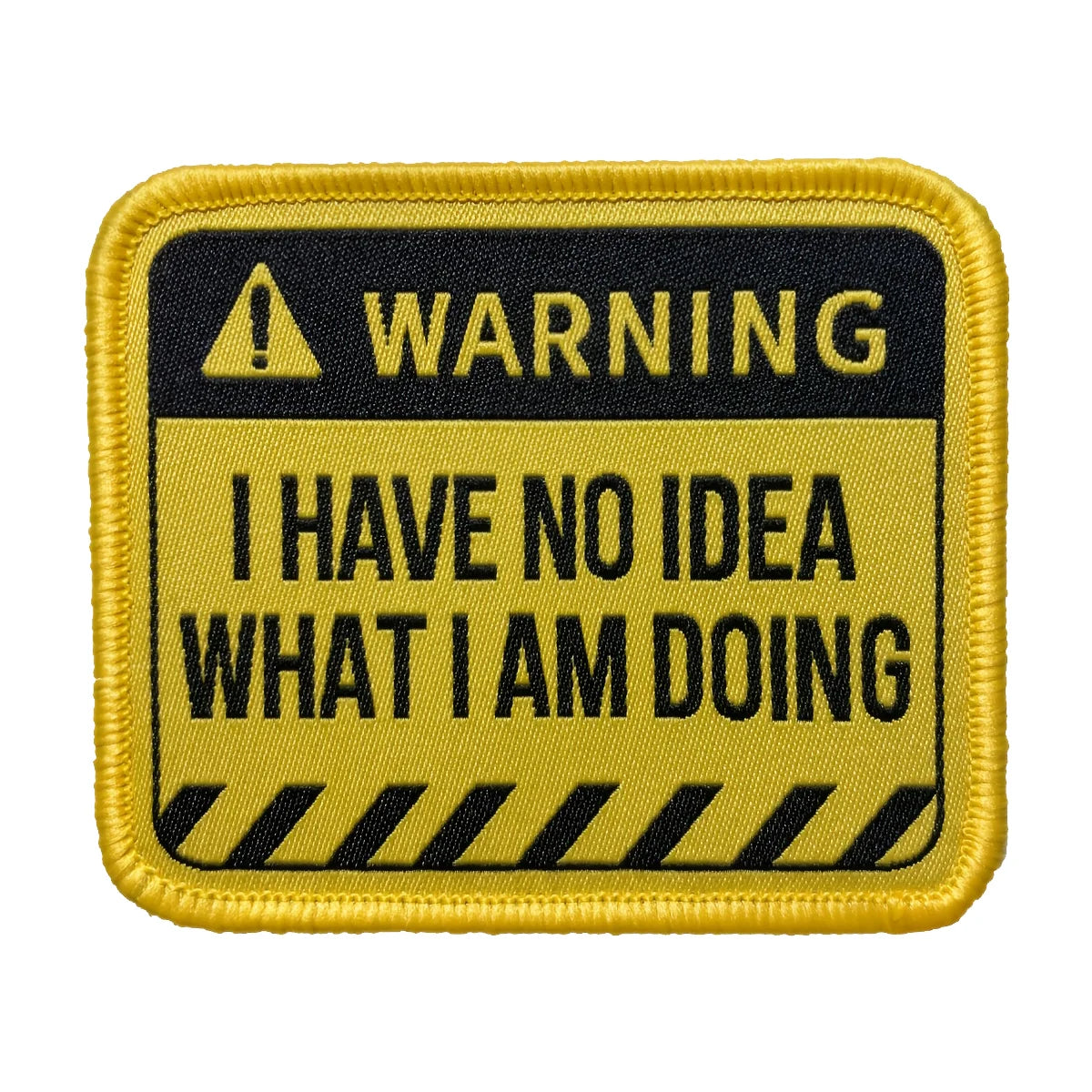 A yellow and black warning patch with text that reads WARNING I HAVE NO IDEA WHAT I AM DOING