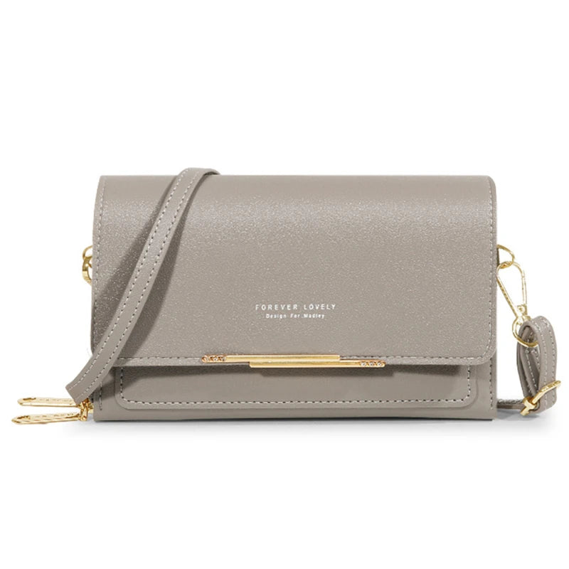 A light taupe women's multi-card shoulder wallet with gold hardware.