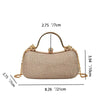 A beige glitter crossbody evening clutch bag with a gold chain strap and a textured fabric.