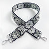 Black and white floral patterned adjustable strap for a crossbody bag