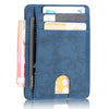 A dark blue slim PU leather card holder wallet displaying several cards and a signature
