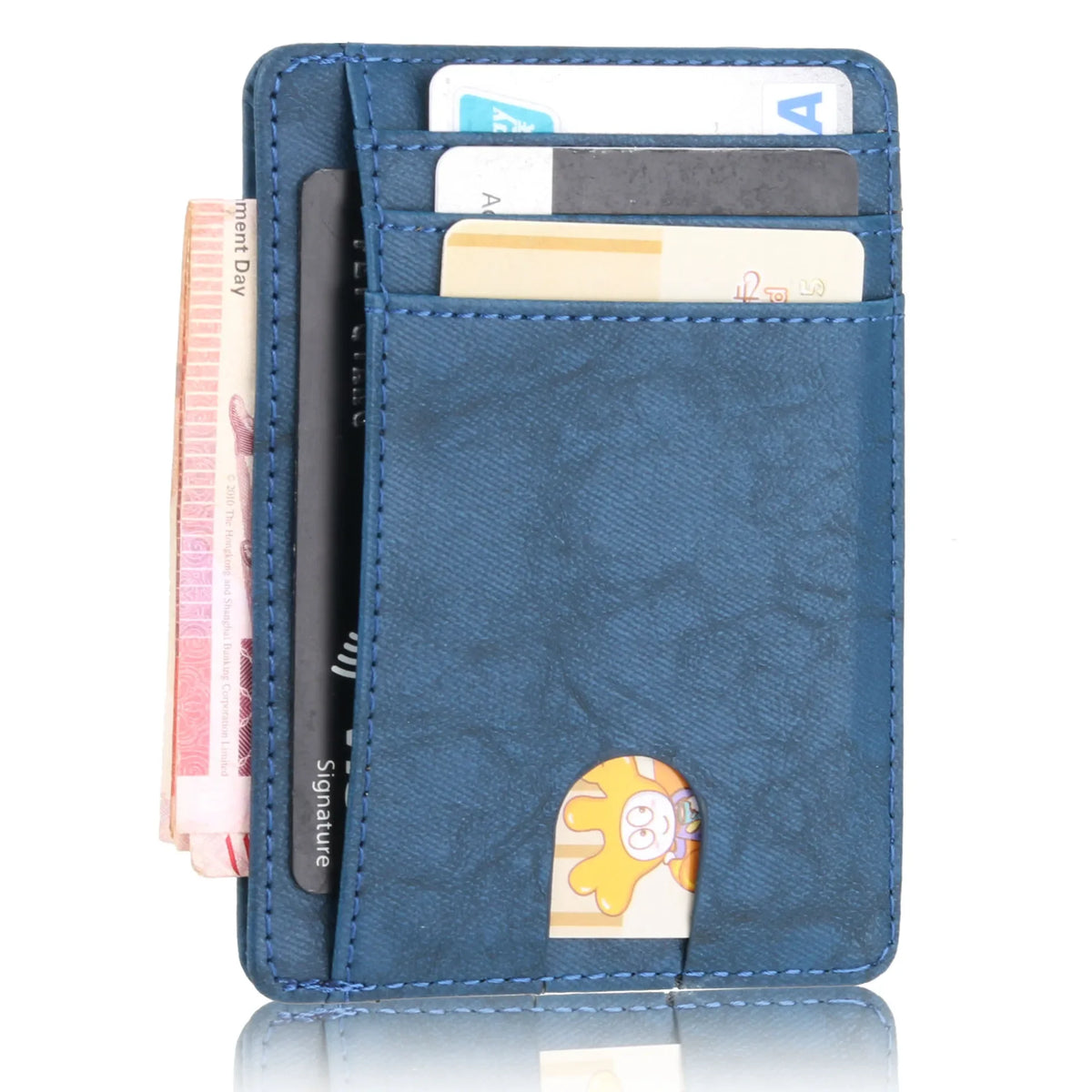 A dark blue slim PU leather card holder wallet displaying several cards and a signature