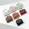 A collection of six Ins-Style women's PU leather mini wallets in various shades of green, pink, brown, and black.