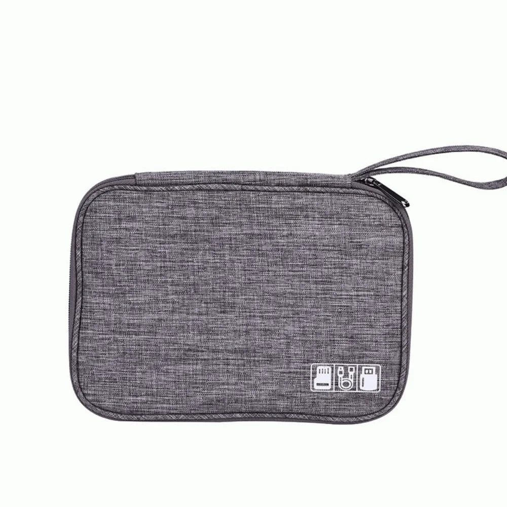 A gray travel cable organizer pouch with multiple storage compartments and a strap.