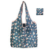 A light blue patterned reusable fashion shopping tote bag shown in a vertical orientation.
