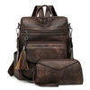 A dark brown retro PU leather travel backpack with a flap and tassel detail.