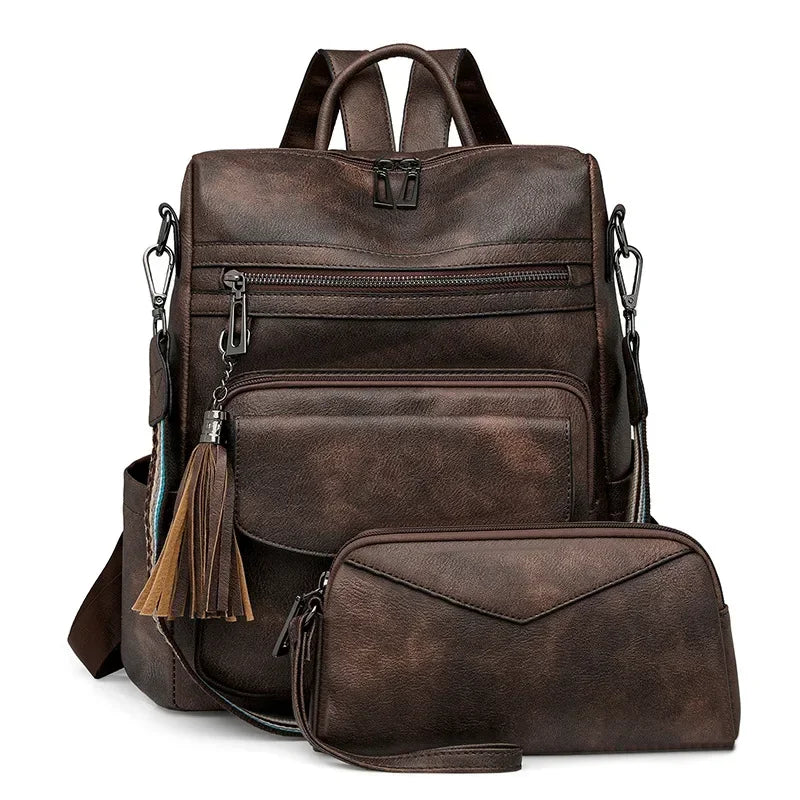 A dark brown retro PU leather travel backpack with a flap and tassel detail.