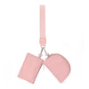 A pink dual zip keychain wallet wristlet with a pink strap.