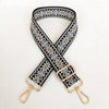 Black and white patterned replacement bag strap with gold-toned adjustable clasps