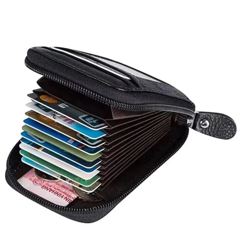 A black slim leather wallet with a flap open, showing several cards inside.