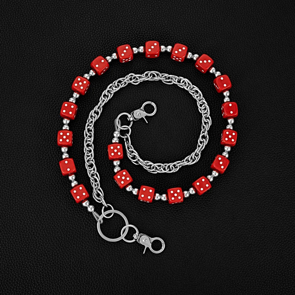 A silver chain necklace featuring red and white dice beads forming a circular pattern.