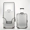 A silver transparent PVC luggage cover set consisting of two upright travel bags with black handles and wheels.