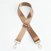 A beige nylon adjustable shoulder strap for bags shown diagonally.