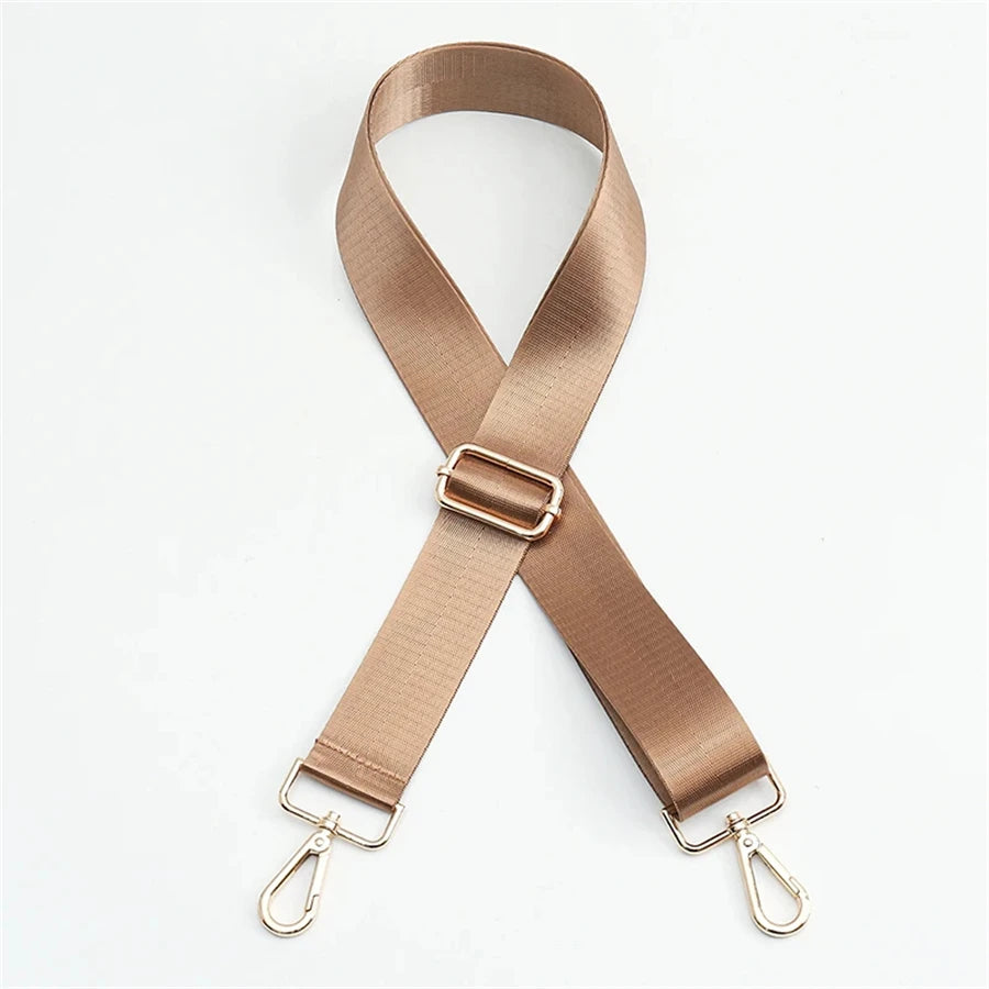 A beige nylon adjustable shoulder strap for bags shown diagonally.