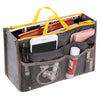 A gray multi-pocket organizer tote bag is shown open, containing various cosmetics and essentials like a smartphone and makeu