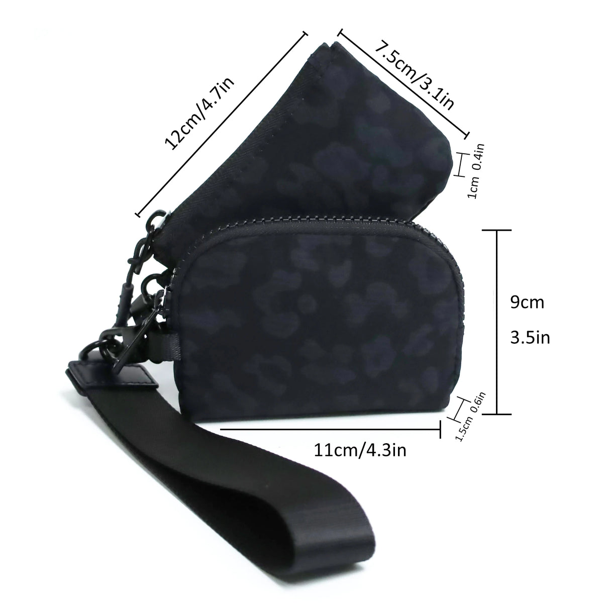 A black mini nylon zipper wristlet pouch for coins and essentials shown with a strap.
