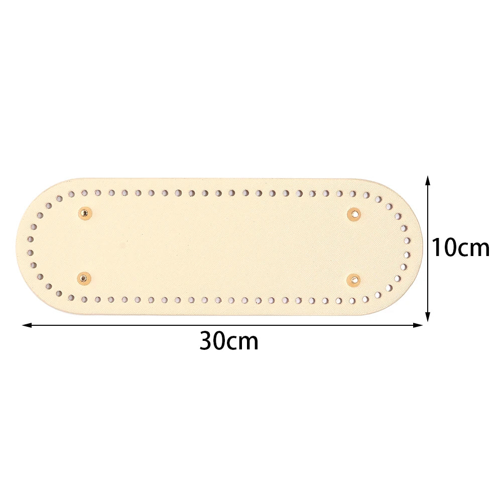 A light beige oval PU leather bag base with pre-punched holes for crochet and knitting projects.