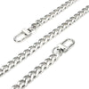A close-up view of a stainless steel diamond-cut curb chain bag strap.