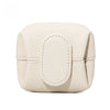 A cream-colored, squarish coin purse with a smooth leather texture and snap closure.