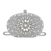 Pochette à clochette ronde et scintillante avec fermoir décoratif et chaîne en argent.