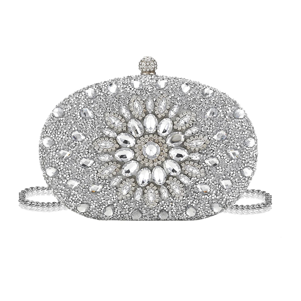 Pochette à clochette ronde et scintillante avec fermoir décoratif et chaîne en argent.