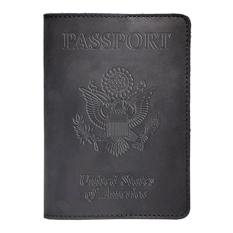 A black genuine leather passport holder featuring the United States of America eagle emblem and text.