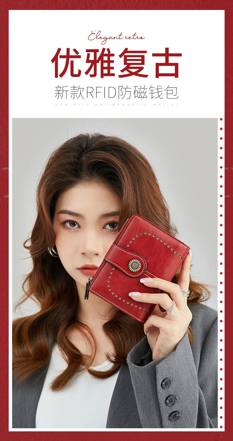 A woman holds a red leather multi-fold RFID protection wallet against her chest.