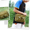 A young man wearing a olive green tactical multifunction fanny pack and black shirt outdoors.