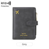 A dark grey multi-functional PU leather travel wallet with a gold airplane emblem.