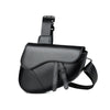 Black men's solid color chest bag with a strap shown from the side.