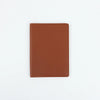 A brown PU leather passport holder with stitched edges shown against a white background.
