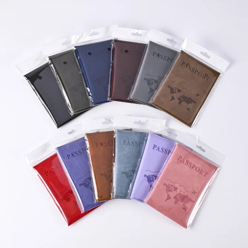 A set of elegant pink leather passport holders in various shades and colors packaged in clear plastic.