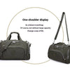 A dark olive green one-shoulder display travel bag shown next to a similar duffle bag.
