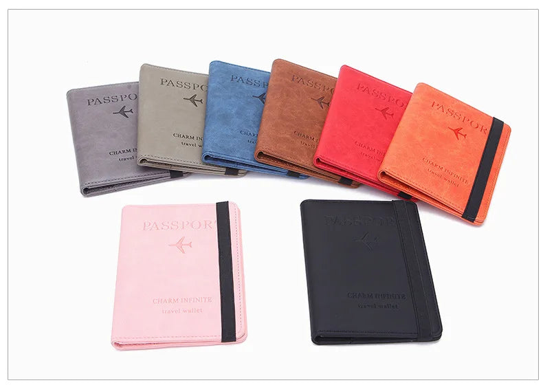 A collection of ten passport holders in various shades of gray, blue, brown, and red leather.