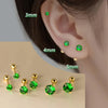 A set of stainless steel ear stud earrings in various sizes, including 3mm, 4mm, and 5mm studs.