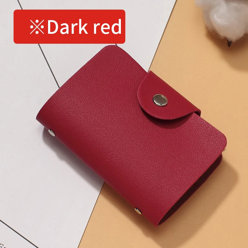 A dark red premium PU leather wallet shown lying on a light background.
