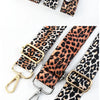 A collection of leopard print adjustable leather straps and buckles for bags shown in various angles.