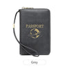 A dark grey passport wallet with a wrist strap and an embossed globe design.