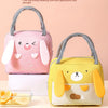 A pink and yellow cute animal insulated thermal picnic lunch bag for kids with a silicone food container.