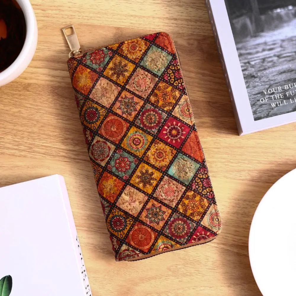 A patterned bohemian wood-grain leather wallet with multiple card slots resting on a wooden surface.
