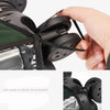 A hand is shown adjusting the black protective cover for a luggage case.