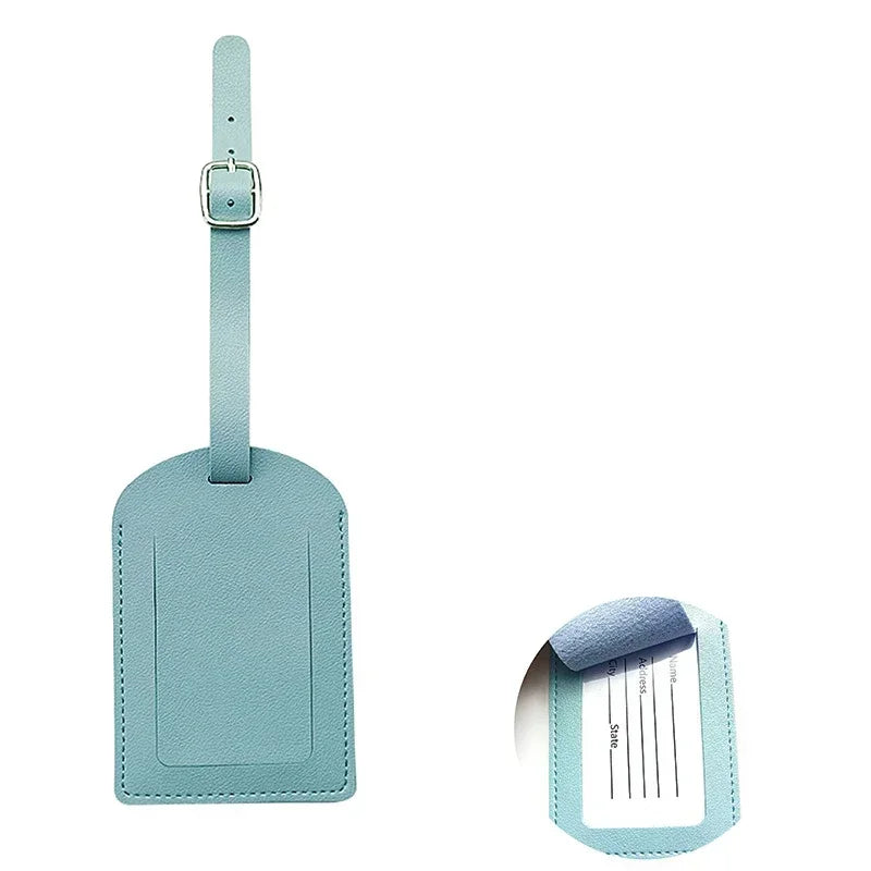 A light blue PU leather luggage tag with a strap, featuring a rectangular design and a slot for information.