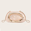 A pale pink, translucent clutch bag with a gold-tone curved flap and thin gold chain strap.