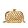 A gold handwoven clutch evening bag with a woven pattern and a gold chain strap.