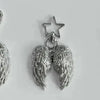 Silver metal angel wing charm with a star pendant on a keyring.