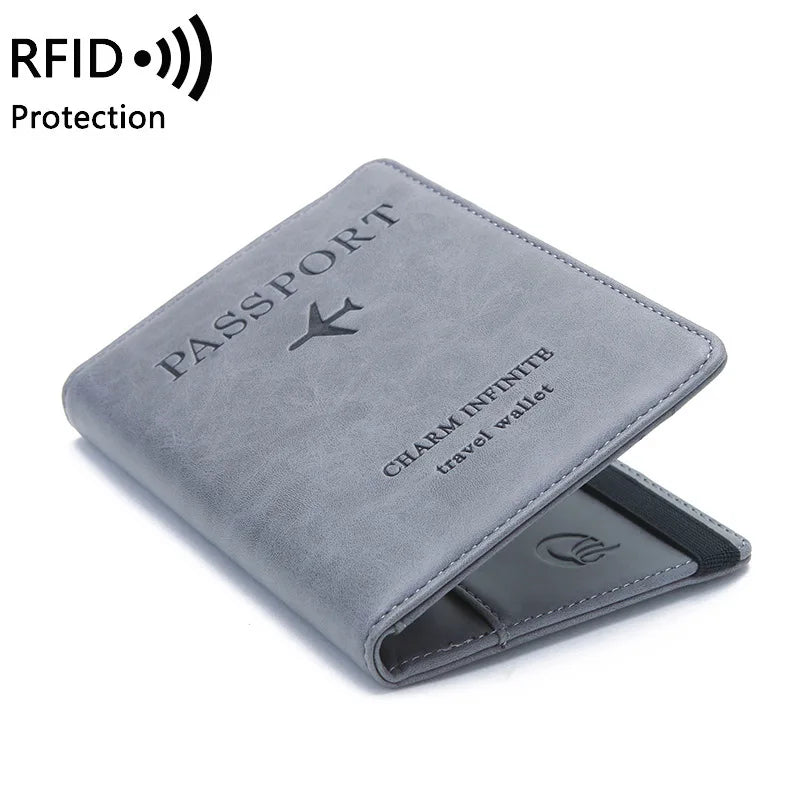 A gray PU leather passport wallet with an RFID blocking feature and a stylized airplane logo.