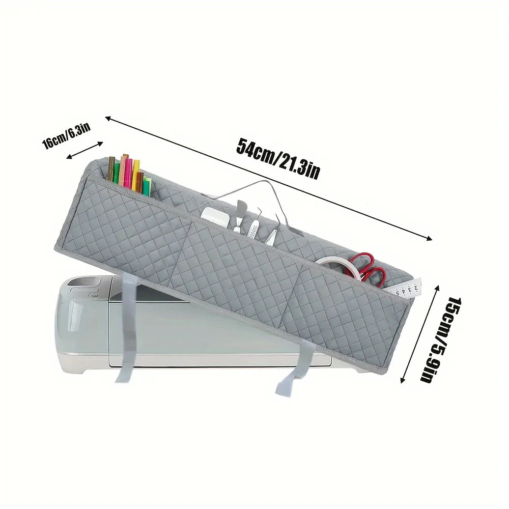 A gray protective cover for a Cricut Maker, shown with dimensions and included tools.