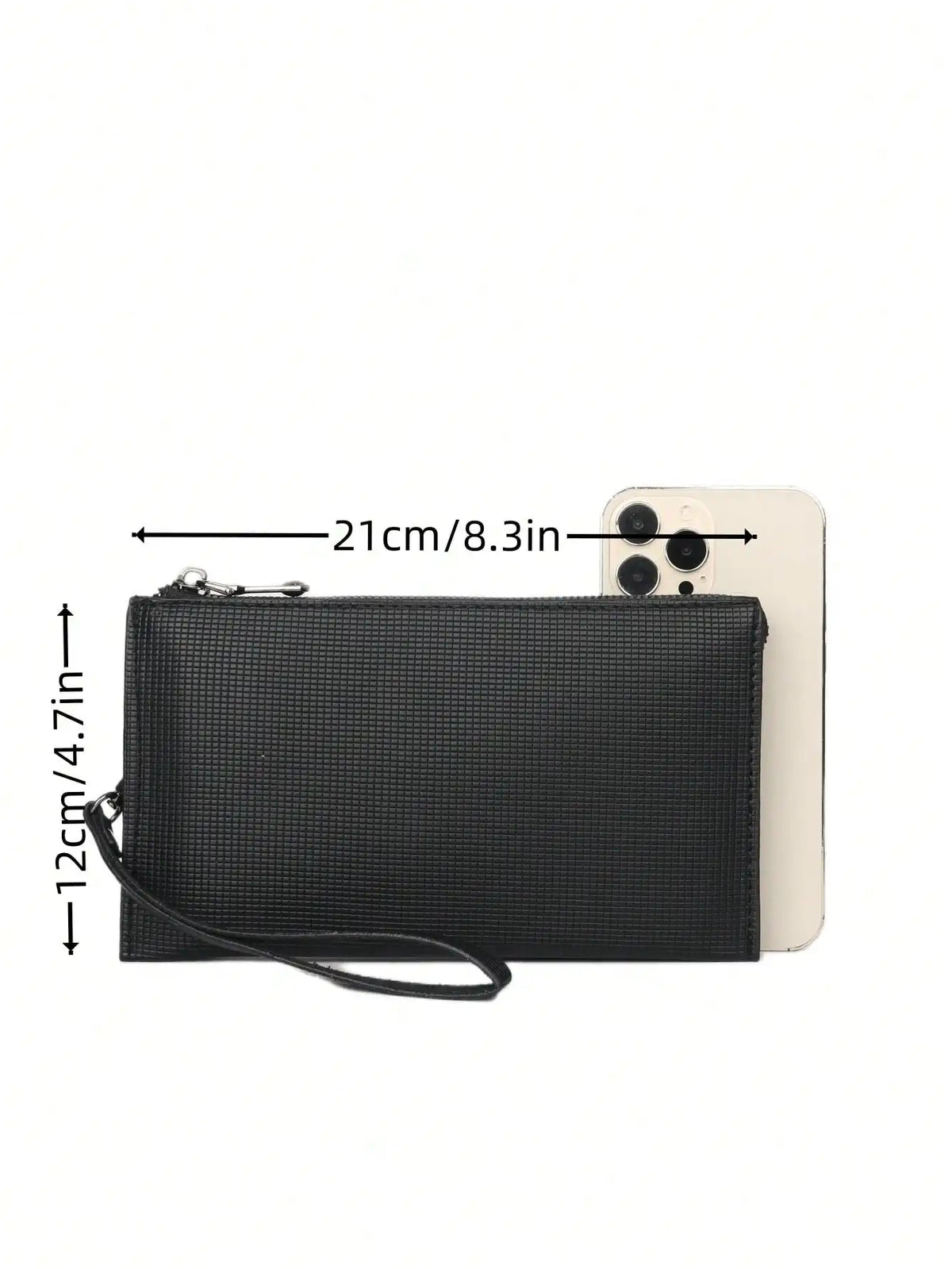 Black clutch bag with a strap shown next to an iPhone for scale.