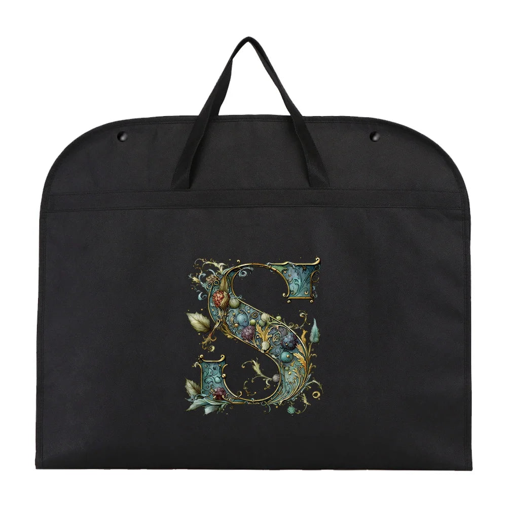 Black fabric dust cover and storage bag with an ornate gold initial S design